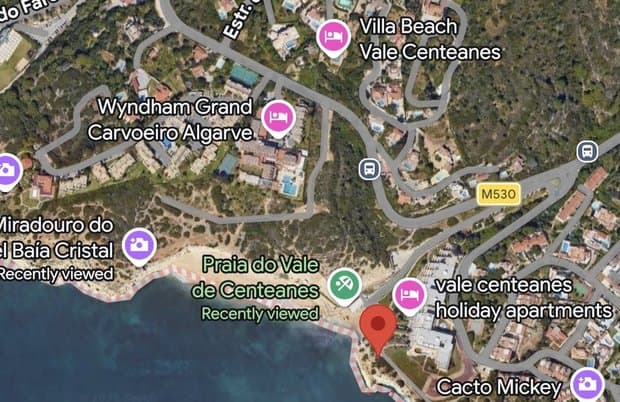 A satellite map of the Carvoeiro coast with a pin dropped at Vale Centeanes, Algarve